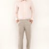 Model wearing a stylish peach color shirt, showcasing its comfortable fit and premium cotton fabric for men.