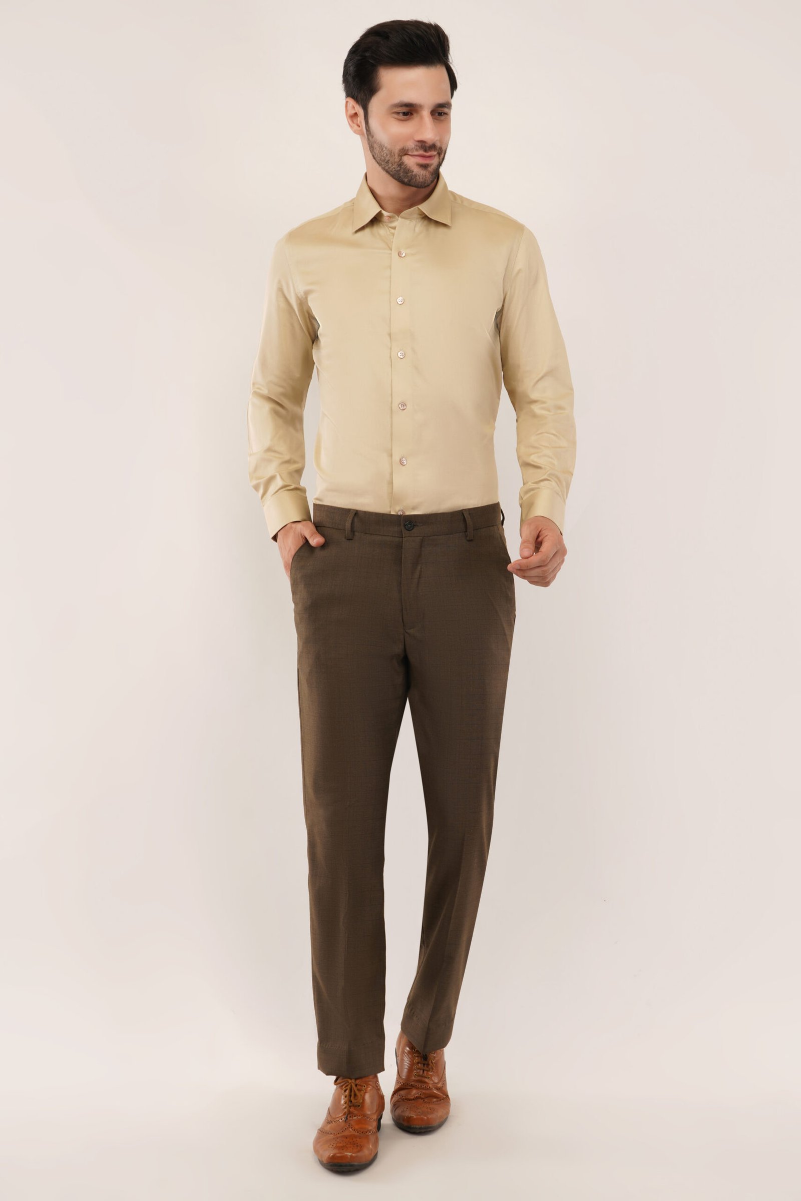 Model wearing a stylish beige colour shirt, perfect for casual and formal occasions.